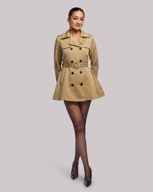 Model wearing Diva short trench coat standing straight