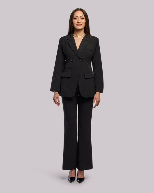 Model wearing Roar blazer standing straight