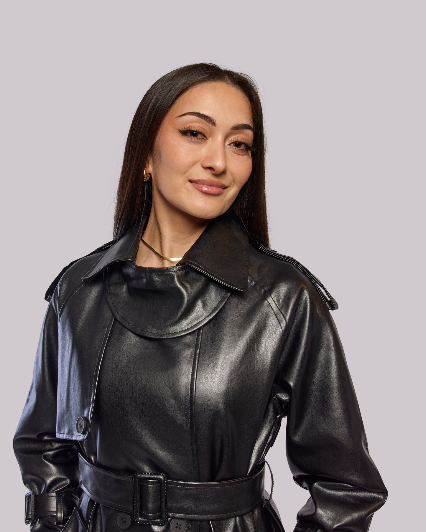 Model wearing Thunder leather trench coat closeup shot