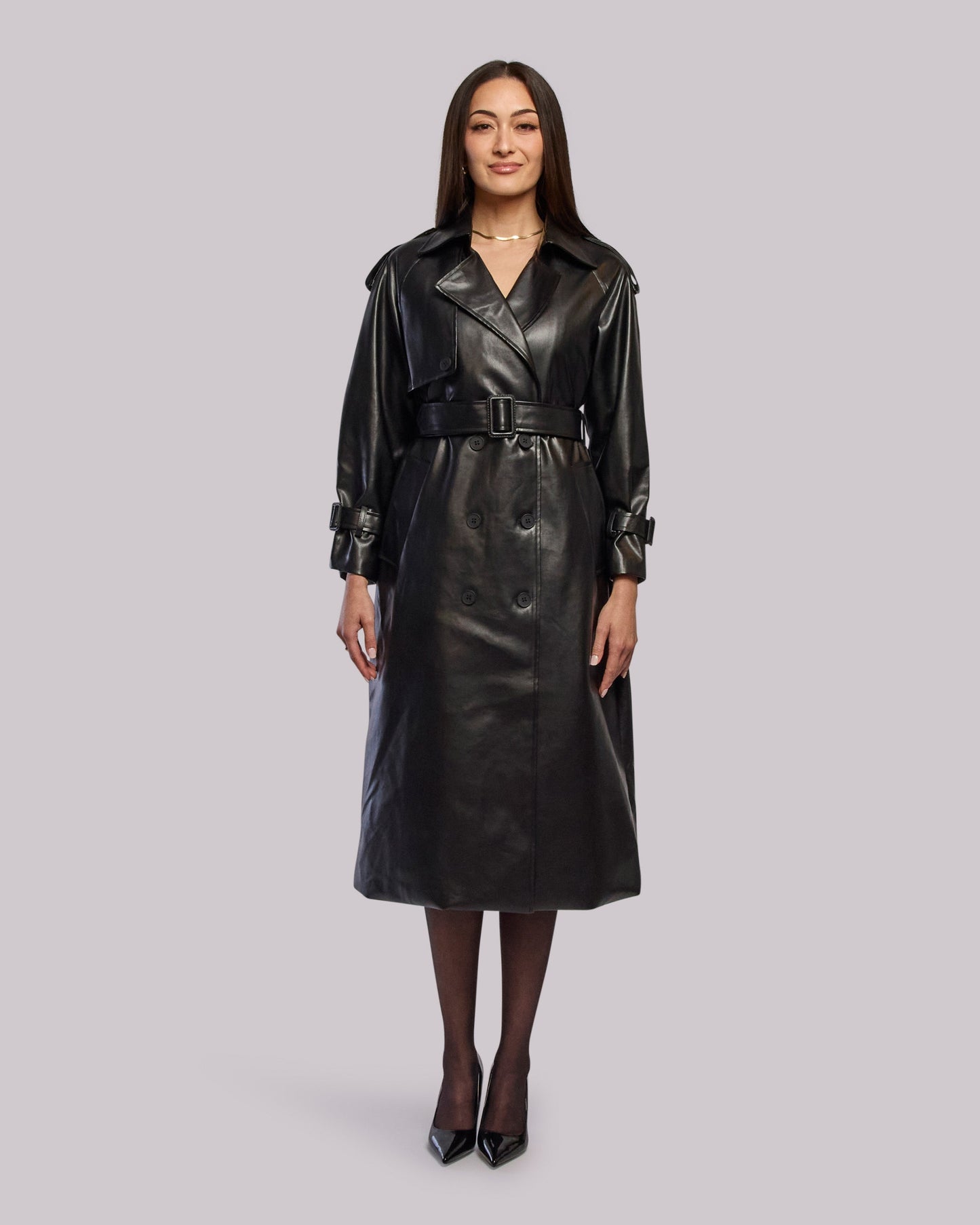 Model wearing Thunder leather trench coat standing straight