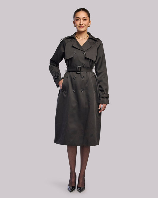 Model wearing Victory black trench coat standing straight