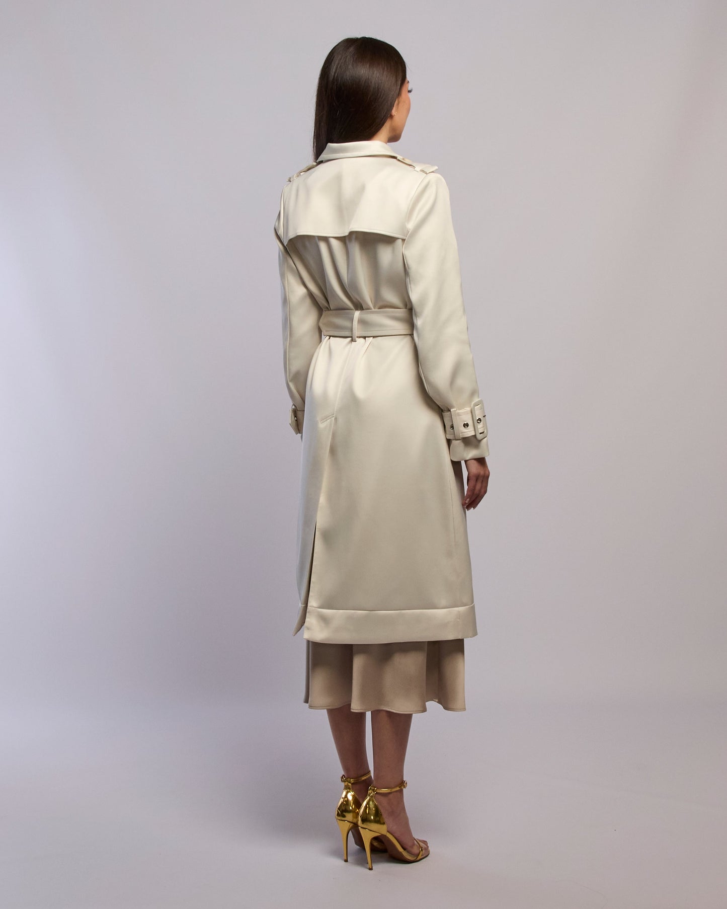 Model wearing Snow silky trench coat standing back angle