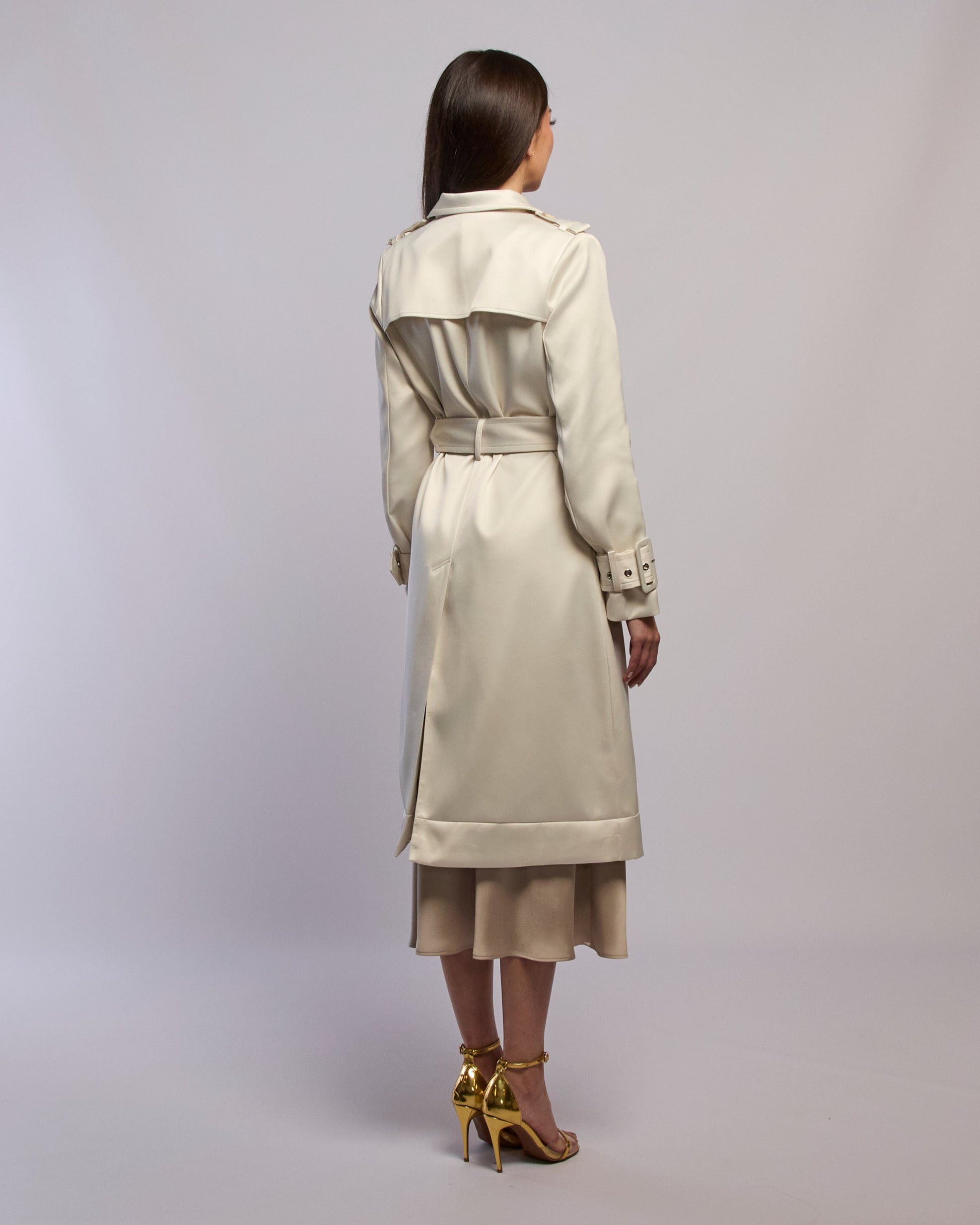 Model wearing Snow silky trench coat standing back angle