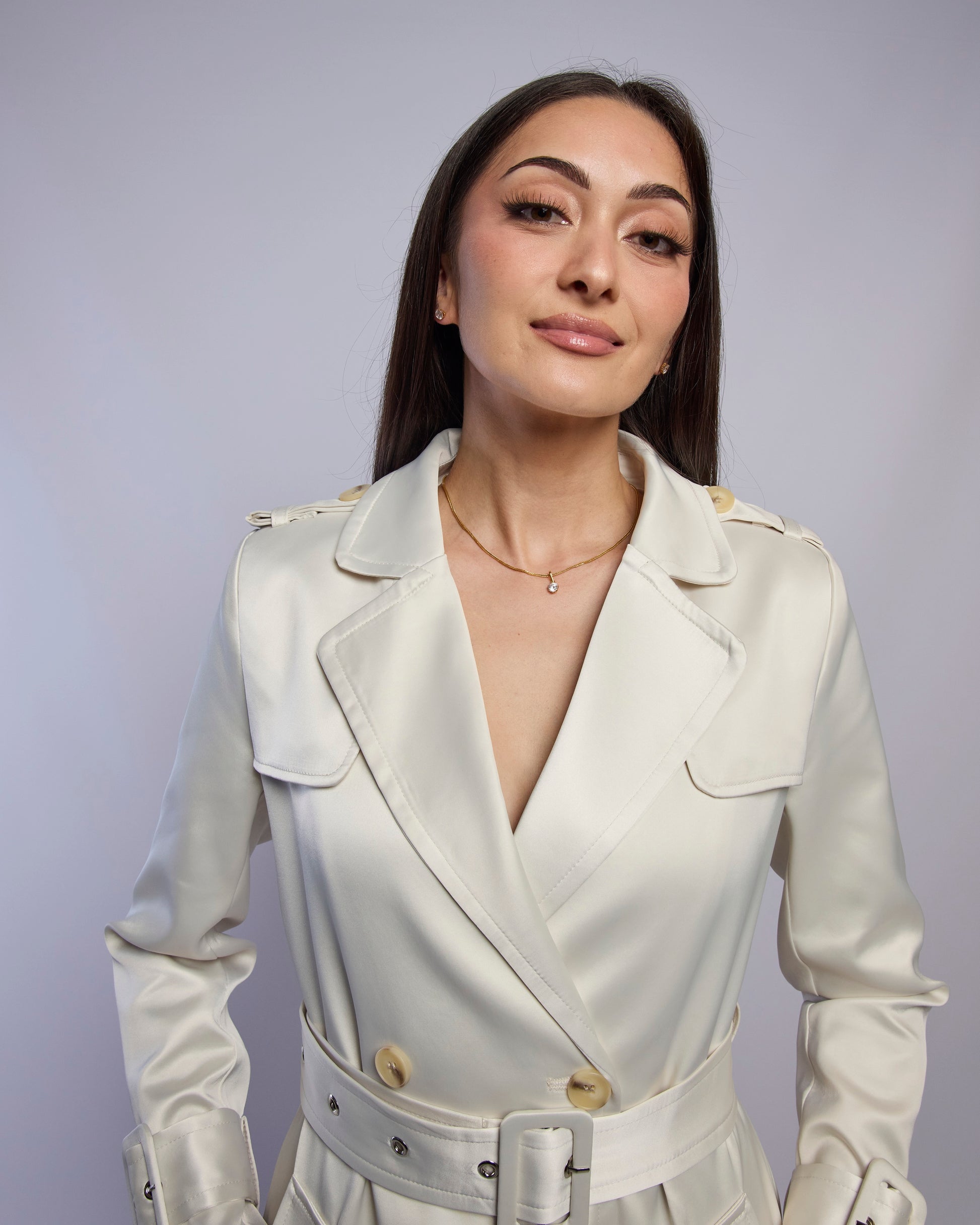 Model wearing Snow silky trench coat closeup shot