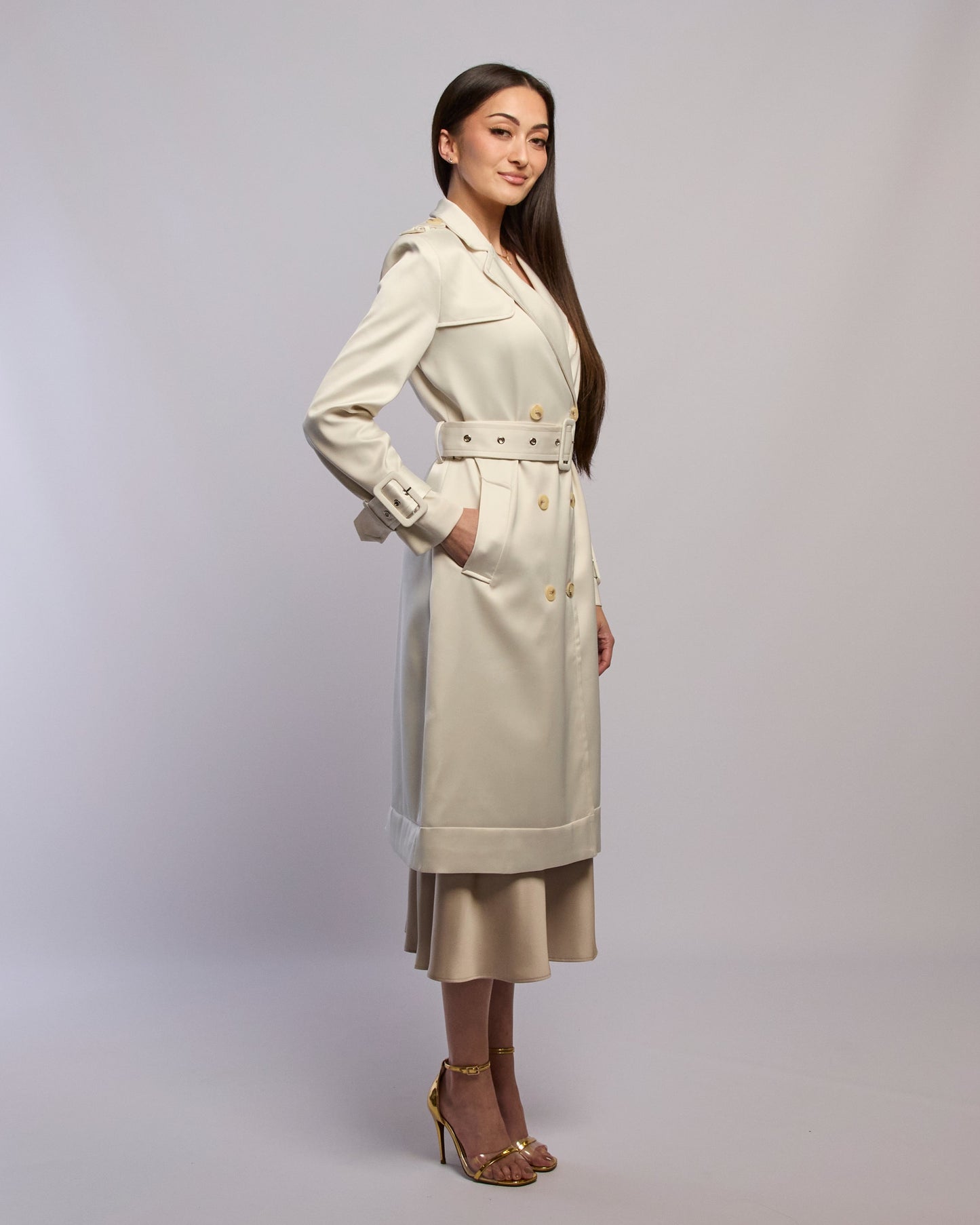 Model wearing Snow silky trench coat standing side angle