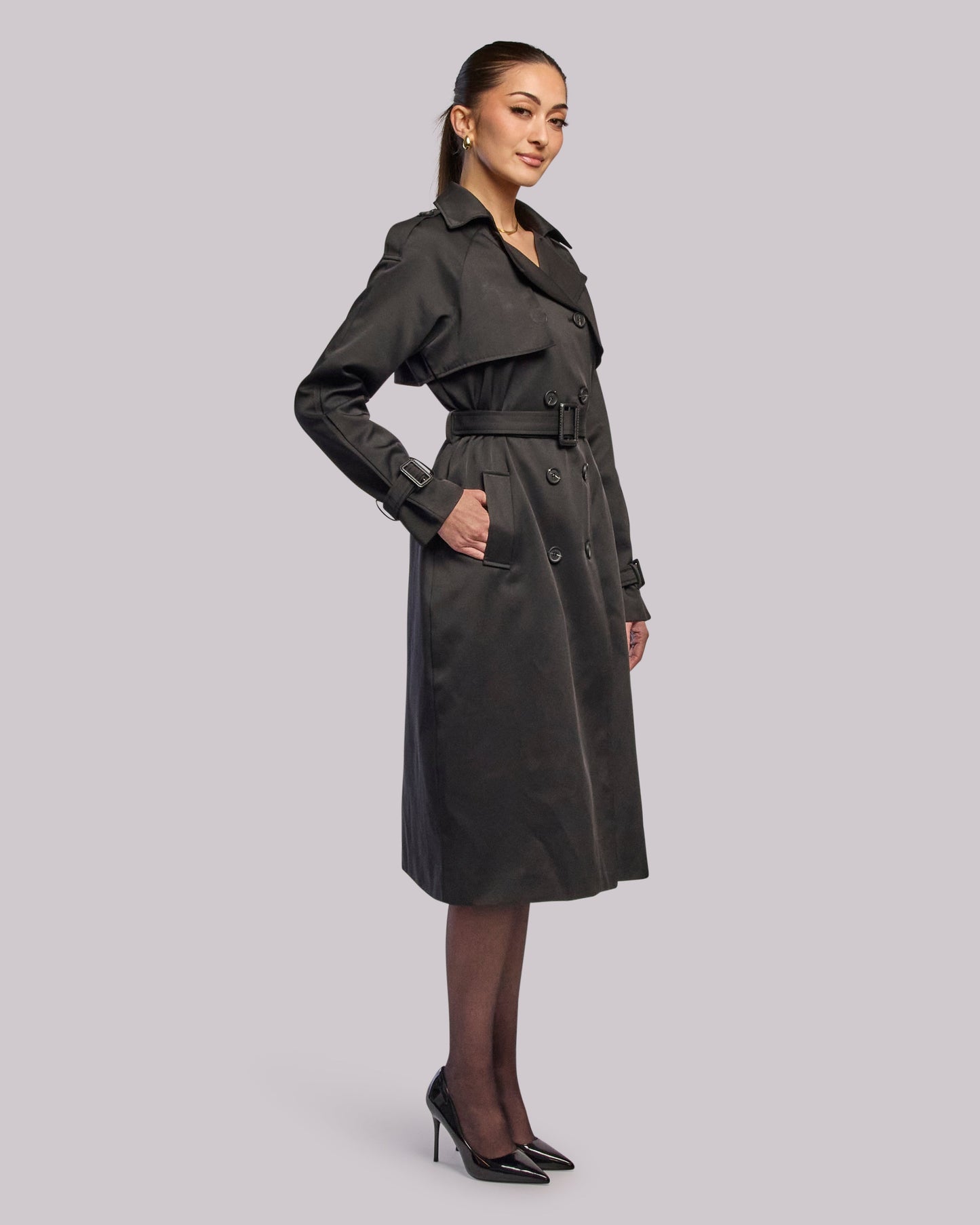 Model wearing Victory black trench coat standing side angle